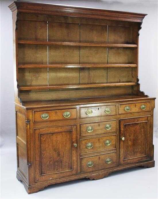 An early 19th century oak dresser, W.5ft 11in. D.1ft 8in. H.7ft